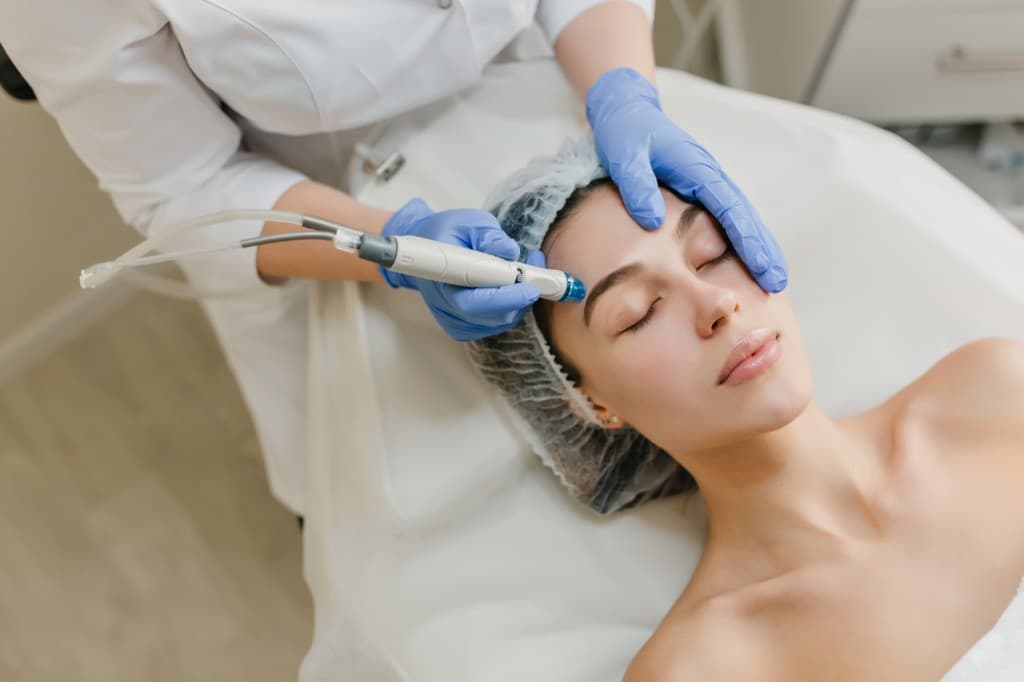 Hydrodermabrasion aqua facial cleansing and hydration treatment